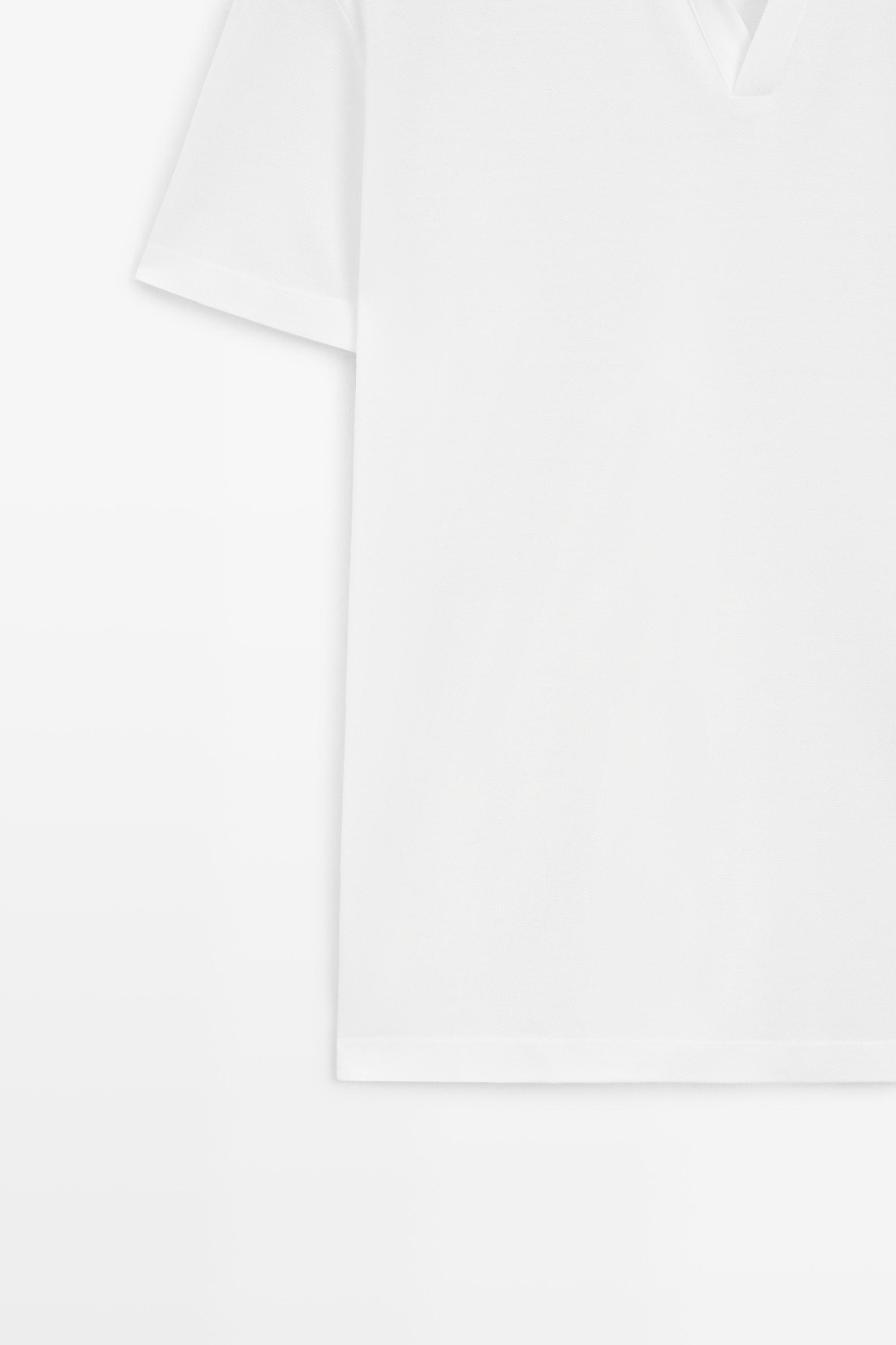 Polo piqué micro-texturé à col en V